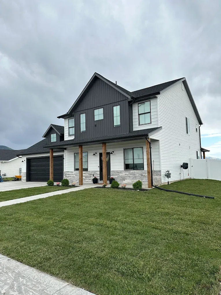 Cache Valley custom home with stormy sky